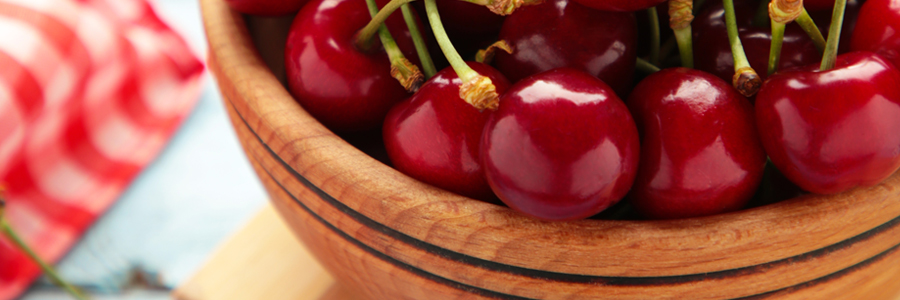 Image of a bowl of organic cherries