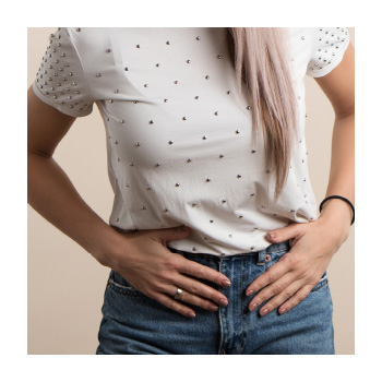 Image of a person holding their stomach