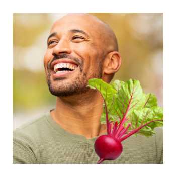 Image of a person smiling and a raddish