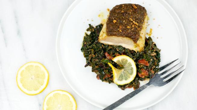 Natural Grocers Pesto Crusted Mahi-Mahi Served with Blistered Tomatoes and Swiss Chard 