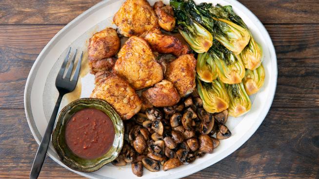 Natural Grocers Sweet and Spicy Korean Roasted Chicken Thighs Served with Mushrooms and Bok Choy
